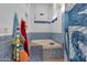 Soaking tub with blue tiling and decorative fixtures, enhancing the relaxing atmosphere in this stylish bathroom at 5231 E Tamblo Dr, Phoenix, AZ 85044