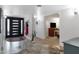 Open entryway with modern front door, coat rack, and stylish decor creating a welcoming atmosphere at 5231 E Tamblo Dr, Phoenix, AZ 85044
