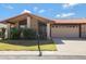 Charming single-story house featuring a two-car garage, landscaped yard, and a tile roof at 5231 E Tamblo Dr, Phoenix, AZ 85044