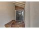 Inviting front entryway features a modern door design with glass panels and a cozy bench at 5231 E Tamblo Dr, Phoenix, AZ 85044