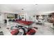 Large game room with a pool table, wet bar with tv, and dining area for entertaining guests at 5404 N 41St St, Phoenix, AZ 85018