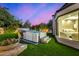 Backyard Hot Tub retreat: A luxurious escape featuring lush landscaping and a private hot tub for relaxation at 5404 N 41St St, Phoenix, AZ 85018