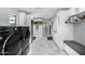 Spacious laundry room with modern appliances, ample storage, and a built-in bench at 5404 N 41St St, Phoenix, AZ 85018