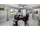 Comfortable office with stylish décor, a ceiling fan, and lots of natural light at 5404 N 41St St, Phoenix, AZ 85018