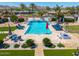 Luxurious pool area with lounge chairs, a pergola, water features, and ample space for relaxation at 5404 N 41St St, Phoenix, AZ 85018