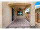 Covered patio with ceiling fan and tile flooring for outdoor relaxation at 5407 S Tatum Ln, Gilbert, AZ 85298