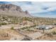 Desert home with mountain backdrop offering privacy and desert landscaping in a unique setting at 5670 E Singletree St, Apache Junction, AZ 85119