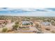 Expansive aerial view of a single-Gathering home on a large lot showcasing the surrounding desert landscape at 5670 E Singletree St, Apache Junction, AZ 85119