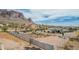 Wide view of the backyard showing a fenced in boundary and mountain views at 5670 E Singletree St, Apache Junction, AZ 85119