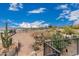 View from rooftop deck overlooking the desert landscape and blue skies at 5670 E Singletree St, Apache Junction, AZ 85119