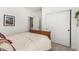 Inviting bedroom featuring neutral tones, closet, and a comfortable bed at 5670 E Singletree St, Apache Junction, AZ 85119