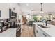 Modern kitchen features white cabinets, stainless steel appliances, and a beautiful view at 5670 E Singletree St, Apache Junction, AZ 85119