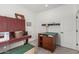 Functional office with vintage furniture, craft desk, and neutral decor at 5670 E Singletree St, Apache Junction, AZ 85119