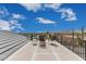 Rooftop deck with furniture and mountain views under a bright blue sky at 5670 E Singletree St, Apache Junction, AZ 85119