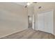 Bedroom features a fan, neutral walls, and a closet for storage at 5808 E Brown Rd # 49, Mesa, AZ 85205