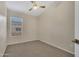 Bedroom featuring a plush carpet, neutral walls, and a window for natural light at 5808 E Brown Rd # 49, Mesa, AZ 85205