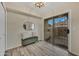 Inviting bonus room with bench seating and sliding door access to the private outdoor space at 5808 E Brown Rd # 49, Mesa, AZ 85205