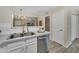 Well-lit kitchen with stainless steel appliances and white subway tile backsplash at 5808 E Brown Rd # 49, Mesa, AZ 85205