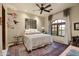 Airy bedroom featuring a decorative rug, soft color palette, and unique window with a garden view at 6102 E Sage Dr, Paradise Valley, AZ 85253