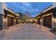 Estate motor court with spacious garages and charming stone and stucco architecture at 6102 E Sage Dr, Paradise Valley, AZ 85253