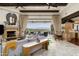 Inviting living room featuring a fireplace, comfortable seating, and an seamless indoor-outdoor flow at 6102 E Sage Dr, Paradise Valley, AZ 85253