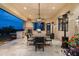 Covered patio with an outdoor dining table and a built-in BBQ at 6102 E Sage Dr, Paradise Valley, AZ 85253