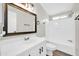Bathroom featuring modern vanity, tiled countertop, and shower at 6921 W Wanda Lynn Ln, Peoria, AZ 85382
