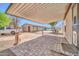 Covered patio made with brick pavers offering a relaxing outdoor space at 6921 W Wanda Lynn Ln, Peoria, AZ 85382