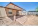 Brick-paved patio area with a covered awning, offering shade and a relaxing outdoor space at 6921 W Wanda Lynn Ln, Peoria, AZ 85382
