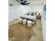 Bright bedroom featuring a decorative rug, stylish stools, and coordinated decor at 727 W Maryland Ave # 1, Phoenix, AZ 85013
