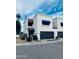 Charming two-story townhouse with a private garage, manicured landscaping, and inviting curb appeal at 727 W Maryland Ave # 1, Phoenix, AZ 85013