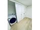 Bright laundry room featuring a Samsung washer and dryer and white doors at 727 W Maryland Ave # 1, Phoenix, AZ 85013