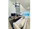 Spacious living room with vaulted ceilings, large windows and modern decor at 727 W Maryland Ave # 1, Phoenix, AZ 85013