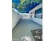 Outdoor patio featuring a blue awning, white walls, and stone features at 727 W Maryland Ave # 1, Phoenix, AZ 85013