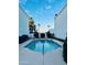 Community pool area with lounge chairs and palm trees, perfect for relaxation and enjoying sunny days at 727 W Maryland Ave # 1, Phoenix, AZ 85013
