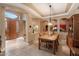 Dining room features a view of the front entry door at 7291 E Eagle Feather Rd, Scottsdale, AZ 85266