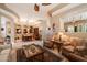 Open-concept living room and dining area with beautiful decor and natural light at 7291 E Eagle Feather Rd, Scottsdale, AZ 85266