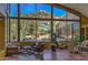 Elegant lobby featuring comfortable seating, a beautiful desert view, and large windows at 7291 E Eagle Feather Rd, Scottsdale, AZ 85266