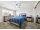 Comfortable bedroom featuring a queen-sized bed, stylish furnishings, and ample natural light at 7307 N 17Th Ave, Phoenix, AZ 85021