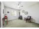 Bright bedroom featuring a ceiling fan, vintage furniture, natural light, and minimalist decor at 7307 N 17Th Ave, Phoenix, AZ 85021