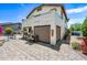 Expansive backyard with a covered patio, lush greenery, and well-maintained landscaping, ideal for outdoor activities at 7342 E Norwood St, Mesa, AZ 85207