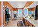 Large main bathroom with glass block window, shower, soaking tub, and walk-in closet at 7342 E Norwood St, Mesa, AZ 85207