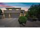 Beautiful two-story home features a two car garage and desert landscaping at 7342 E Norwood St, Mesa, AZ 85207