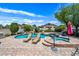 Backyard featuring a sparkling pool and spa, perfect for relaxing and entertaining on a sunny day at 7342 E Norwood St, Mesa, AZ 85207