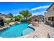 Inviting pool area with brick patio, perfect for relaxation and entertaining at 7342 E Norwood St, Mesa, AZ 85207