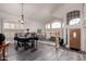 Bright dining room with wood floors and abundant natural light at 7460 E Kiowa Ave, Mesa, AZ 85209