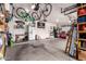 Clean and organized garage with plenty of storage space for vehicles, tools, and equipment at 7460 E Kiowa Ave, Mesa, AZ 85209