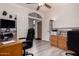 Bright office space with a large desk, nautical-themed decor, and plenty of natural light for a comfortable workspace at 7460 E Kiowa Ave, Mesa, AZ 85209