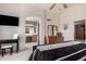 Warm main bedroom with access to a bathroom at 7460 E Kiowa Ave, Mesa, AZ 85209