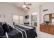 Relaxing main bedroom with walk-in closet and a ceiling fan at 7460 E Kiowa Ave, Mesa, AZ 85209